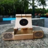 Wireless charger with speaker and power bank